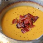 Curried Sweet Potato Bisque topped with Candied Bacon | ScrambledandSpiced.com